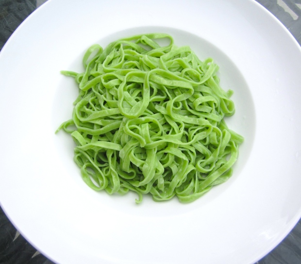 cook spinach linguini al dente, drain, toss with olive oil 